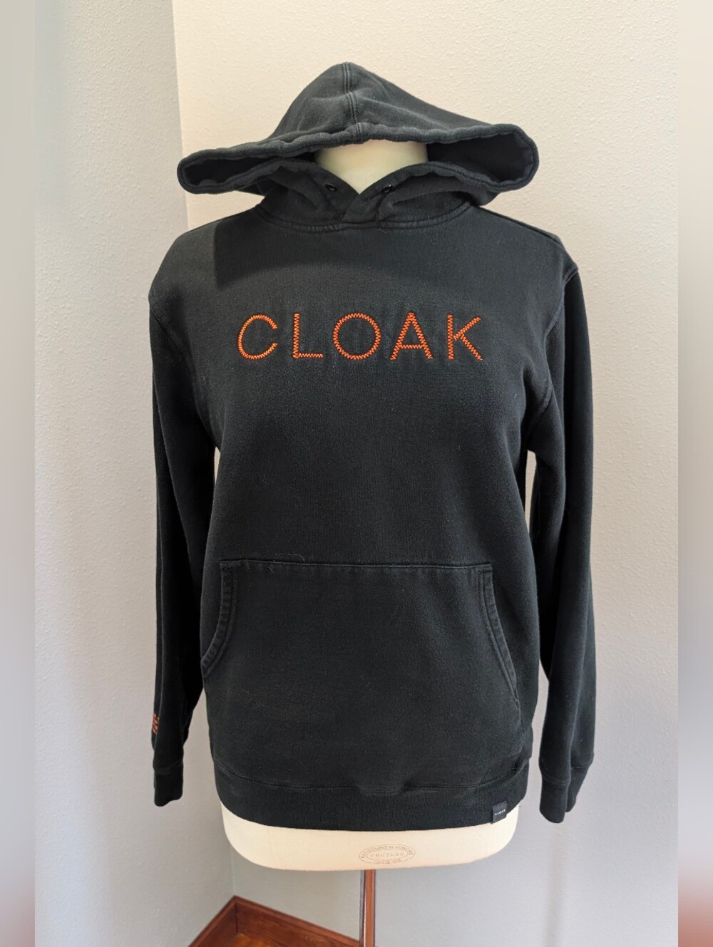 CLOAK Black Hoodie with Orange Accent